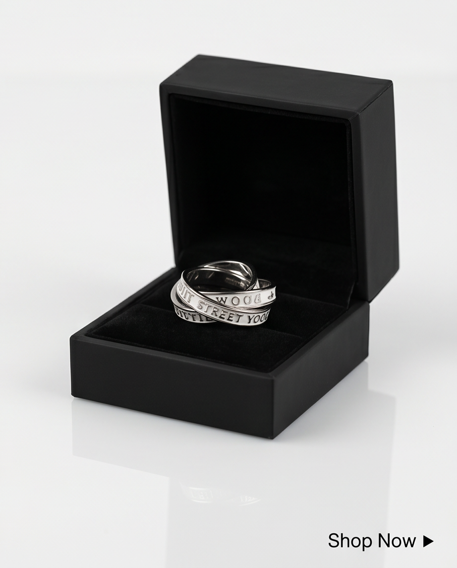 Silver triple interlocking text band ring presented in black velvet jewellery box