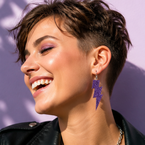 Purple Glitter Lightning Bolt Drop Earrings - hand hold close up