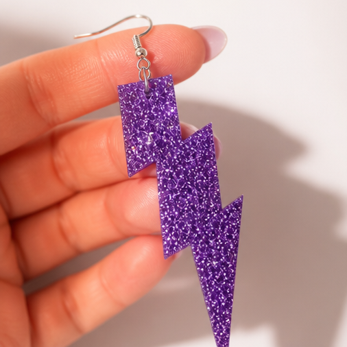 Purple Glitter Lightning Bolt Drop Earrings - model wearing