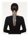 Crystal rhinestone fringe ponytail hair wrap worn on model at gala event in black backless dress