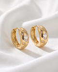 Gold Celestial Star Hoop Earrings — close-up ring detail