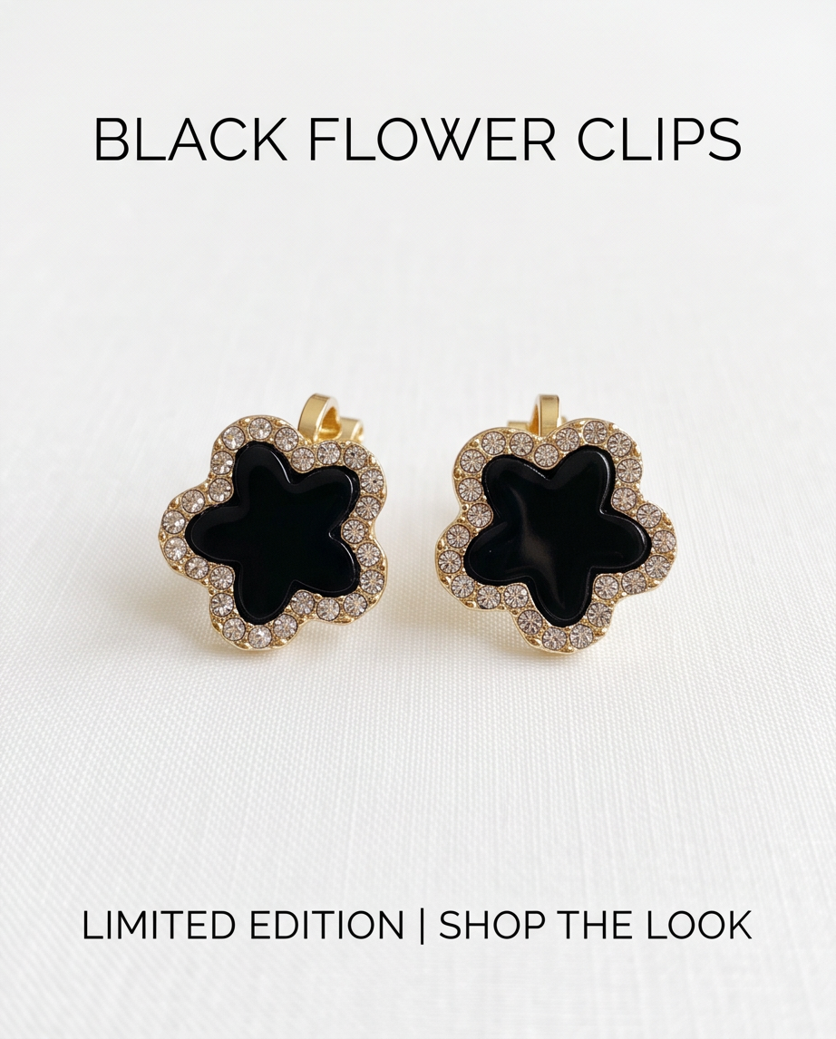 Black enamel clover crystal clip earrings - model wearing