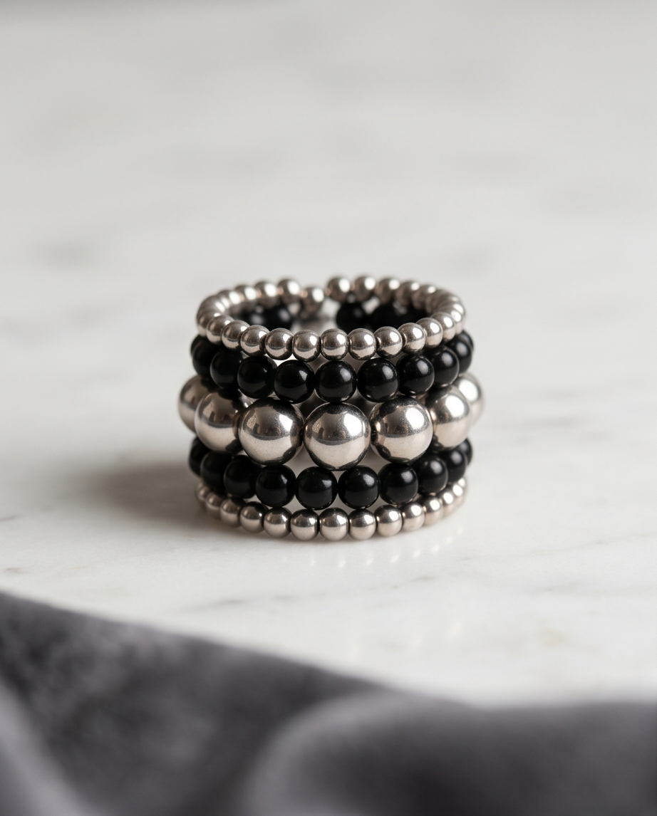 Black Onyx & Silver Bead Stacked Wide Band Ring in black velvet gift box on marble surface
