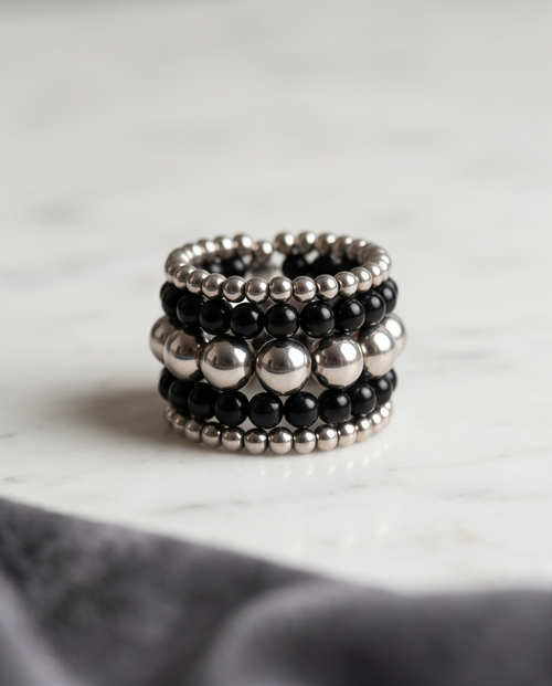 Black Onyx & Silver Bead Stacked Wide Band Ring in black velvet gift box on marble surface