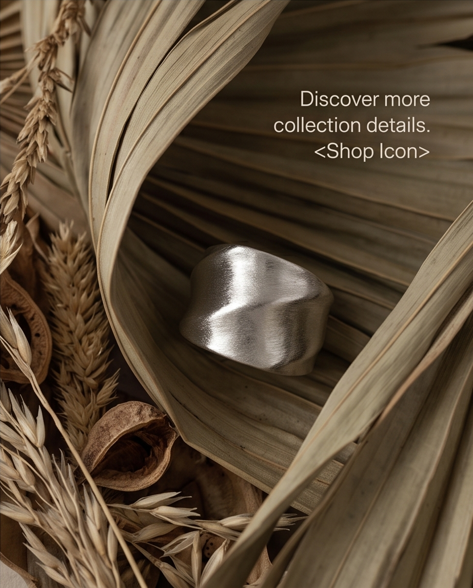 Discover more collection details campaign — 925 silver plated brushed dome sculptural twisted facet wide band ring nestled in dried palm leaf with wheat and botanicals — editorial campaign shot