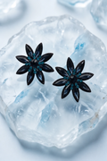 Navy Crystal Flower Stud Earrings product shot on ice crystal