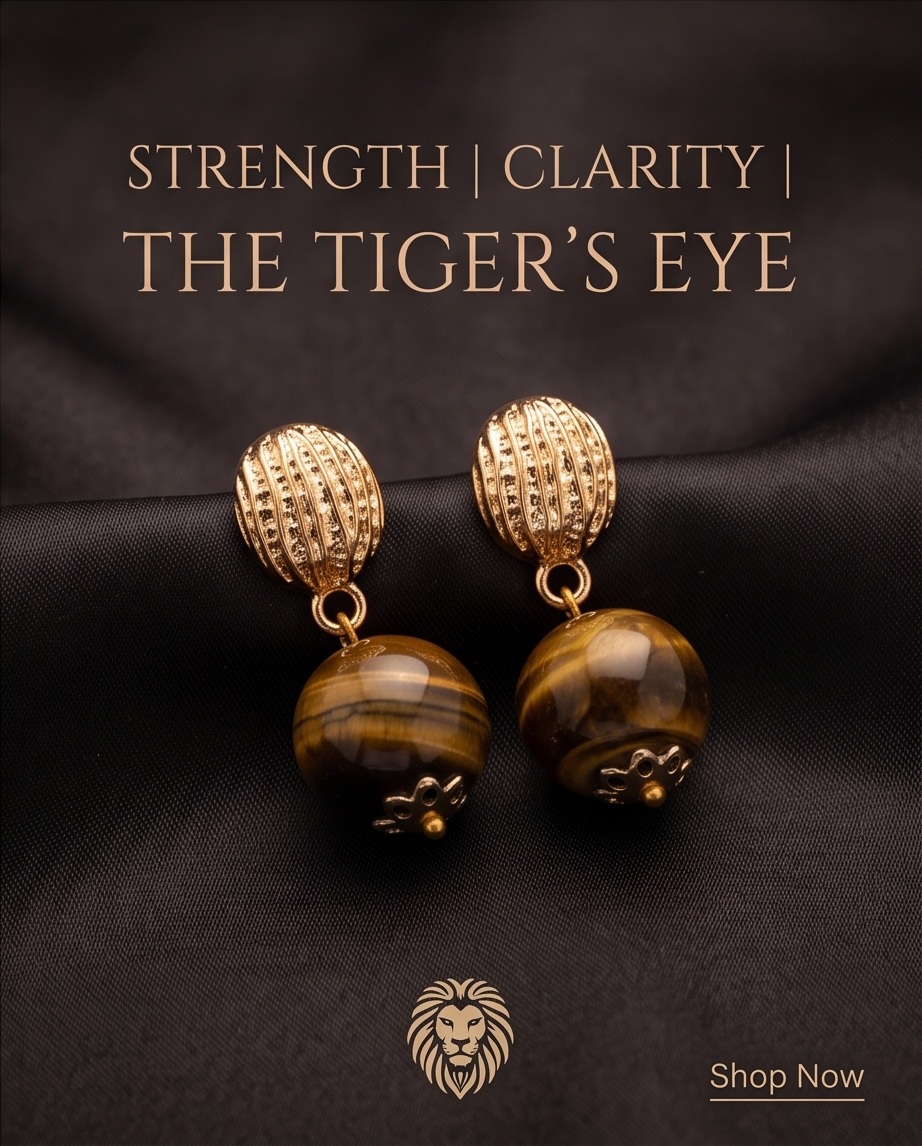 Gold Ribbed Dome Tiger's Eye Ball Drop Earrings campaign flat lay on black satin with Strength Clarity Tiger's Eye text