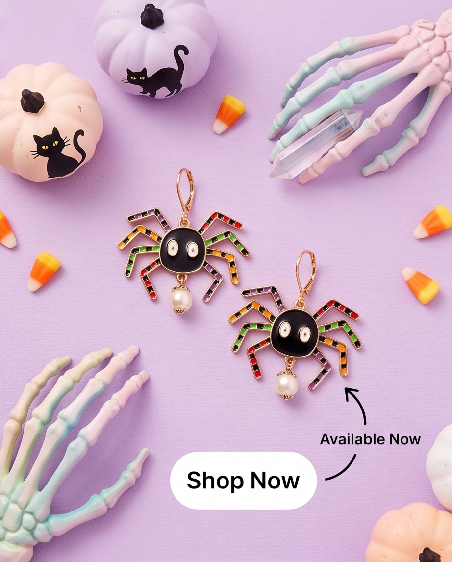 Rainbow Spider Pearl Drop Earrings pair on pink background