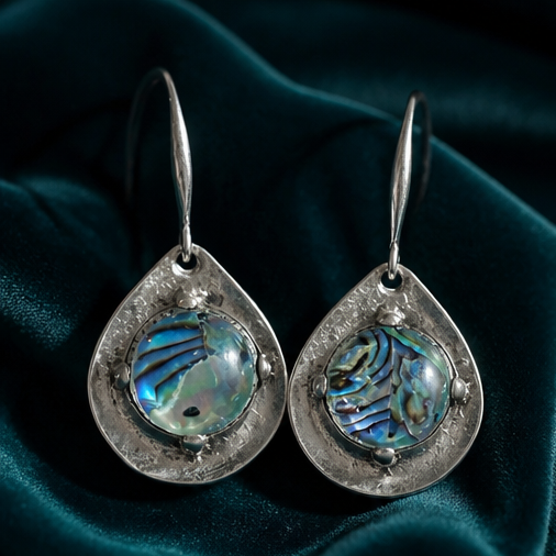 Pair of silver-tone iridescent teardrop drop earrings with blue-green colour-shift centre detailing