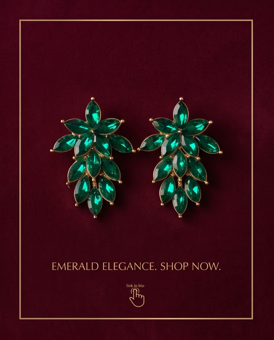 Close-up of emerald green marquise-shaped stones in floral drop earring