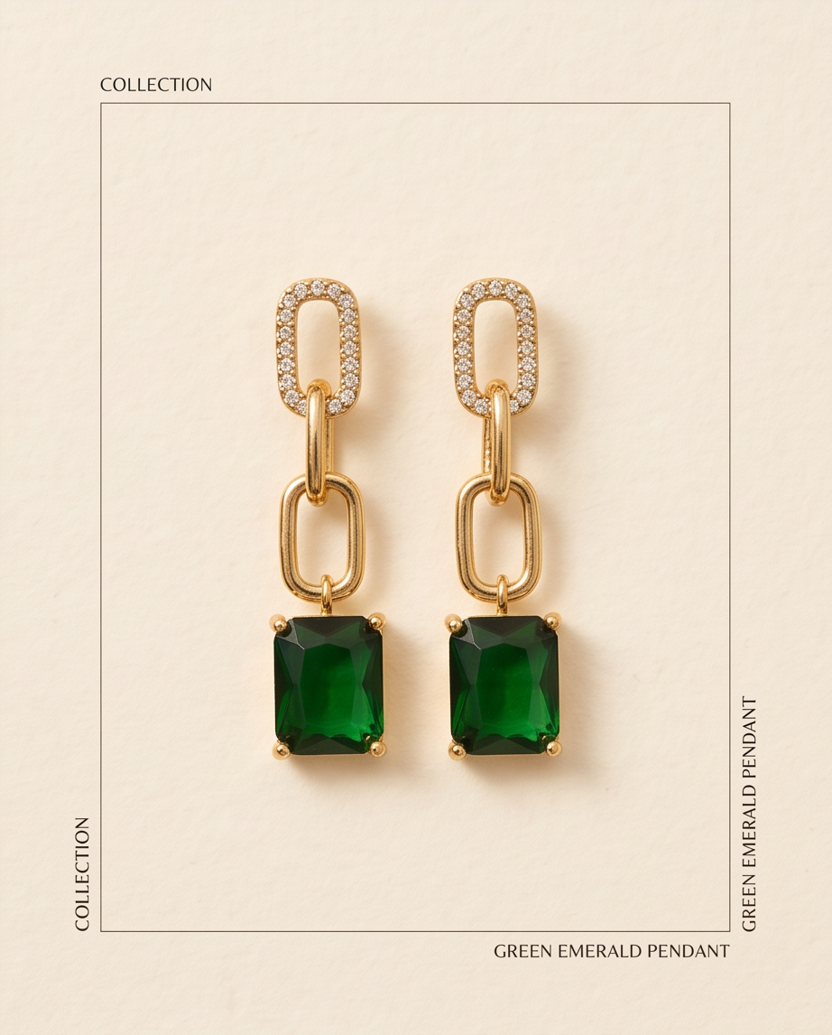 Model wearing a green stone and gold-tone chain drop earring