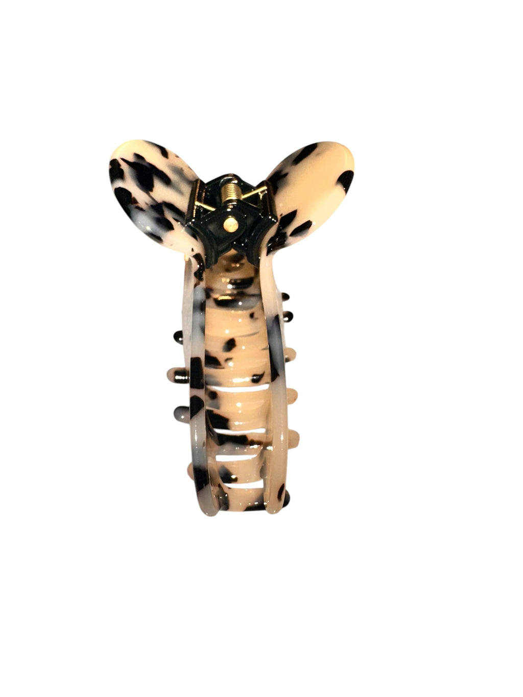 Claw-shaped hair clip with leopard print design on a white background