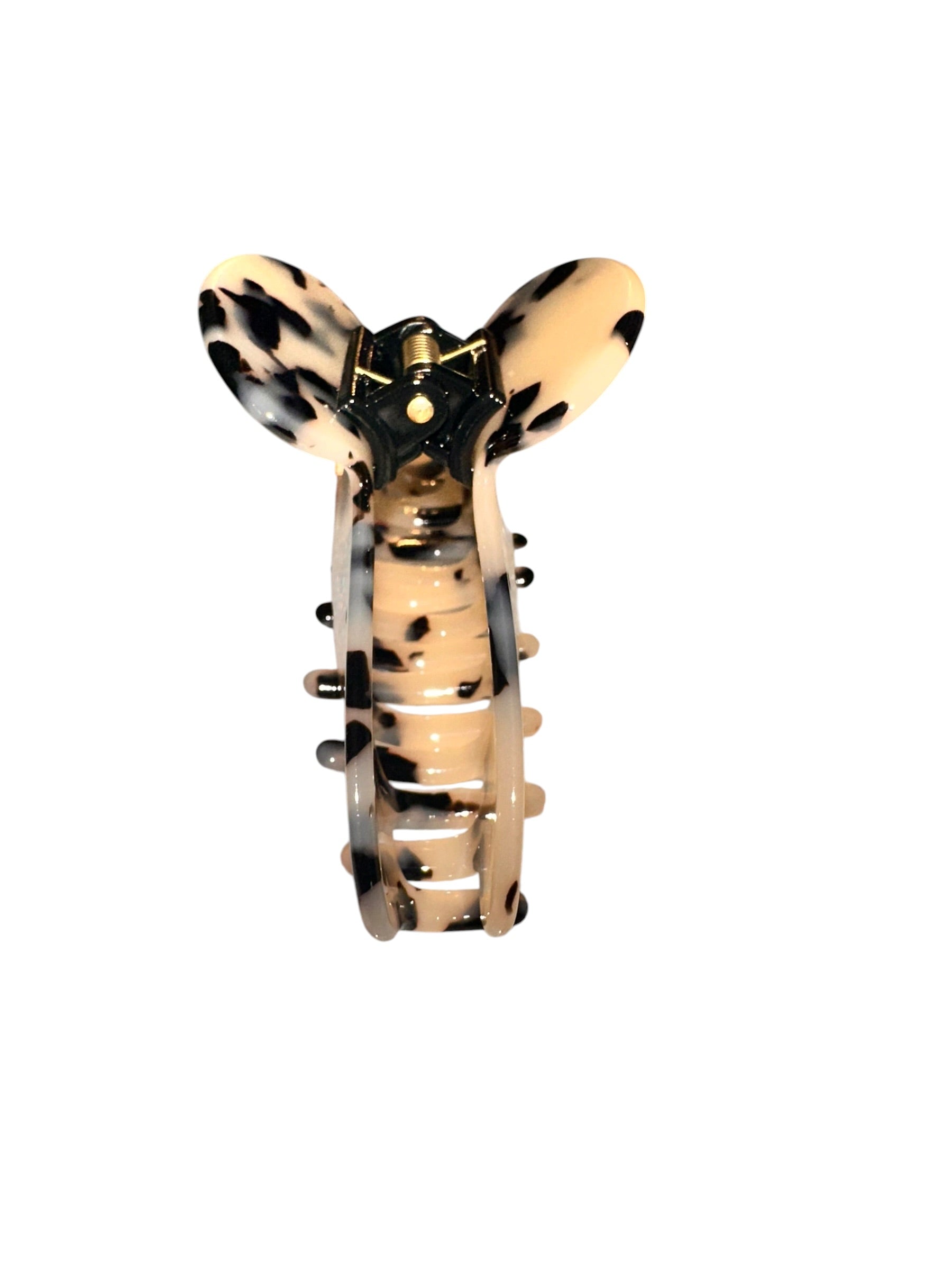 Claw-shaped hair clip with leopard print design on a white background