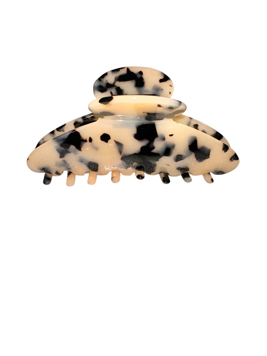 Black and white patterned hair clip on a white background
