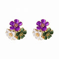 Purple enamel flower cluster stud earrings lifestyle shot on model