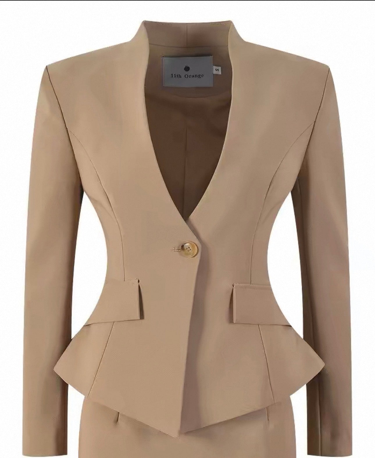A beige tailored blazer with a deep V-neckline, single gold button, structured shoulders, and a peplum waist detail, shown against a plain white background.