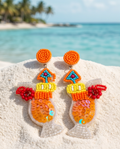 Close-up of tropical cocktail beaded earring showing orange sequins and seed bead detail