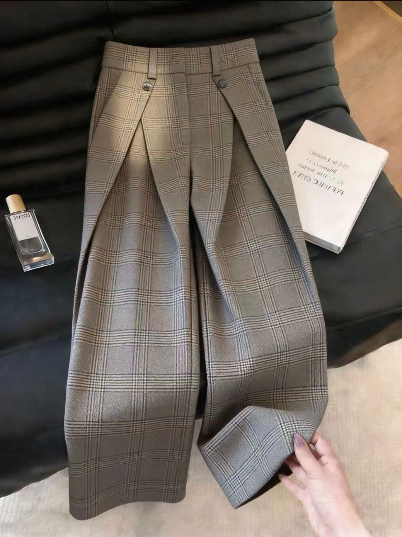 Brown plaid wide-leg trousers flat lay