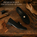 Black Suede Gold Medallion Loafers - hero shot on workshop surface