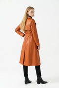 Cognac faux leather trench coat - front view on model