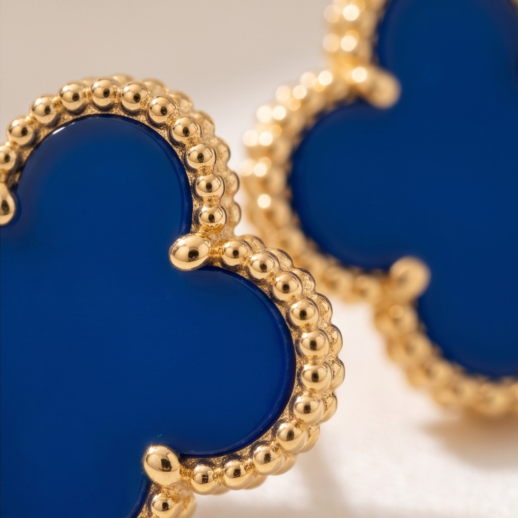 Model wearing blue clover stud earrings