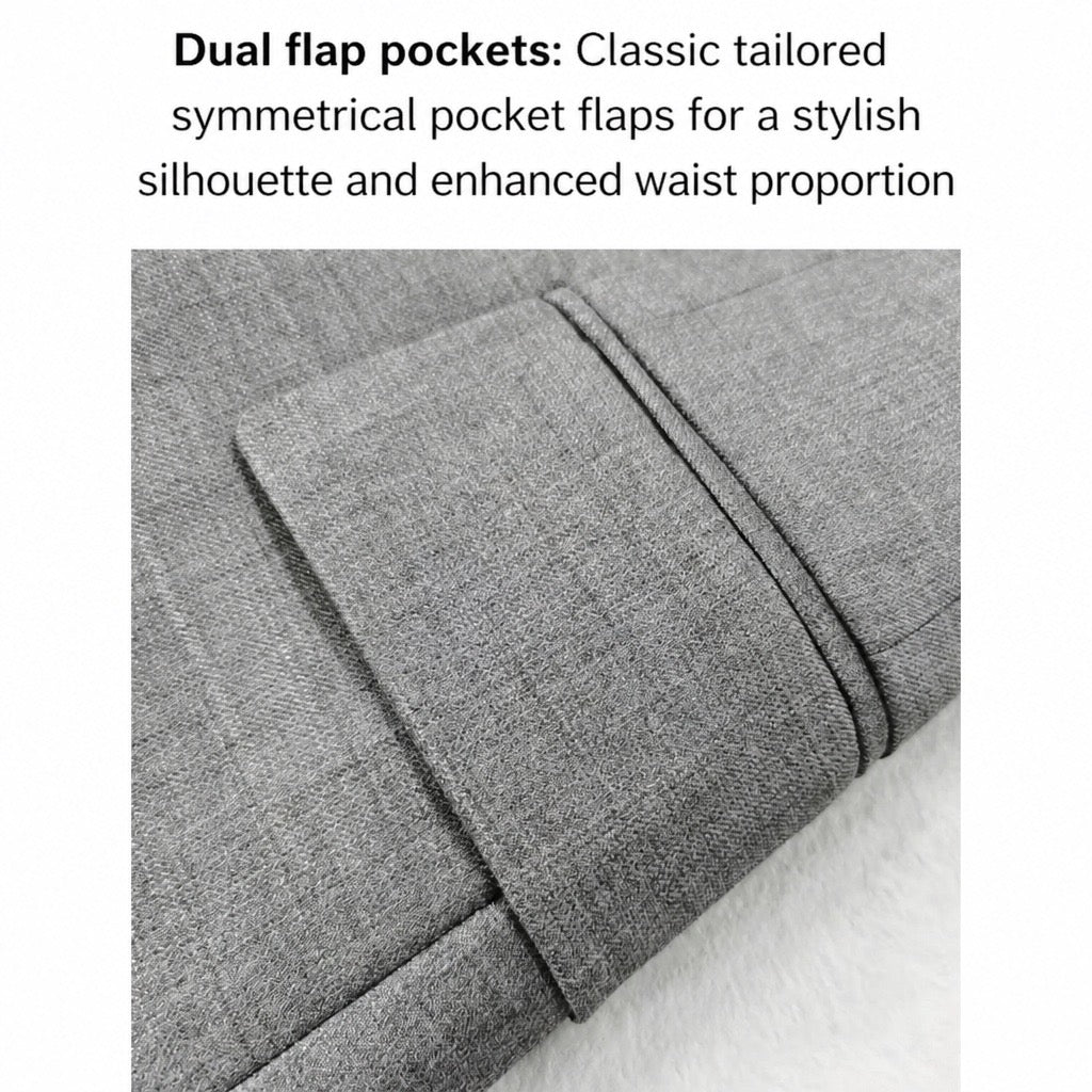 Close-up of a gray textured fabric garment detail with a folded flap pocket and overlaid text reading 'Dual flap pockets: Classic tailored symmetrical pocket flaps for a stylish silhouette and enhanced waist proportion'.
