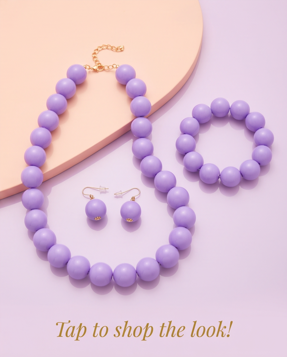 Lilac ball bead necklace, bracelet and earring set flat lay on lilac background