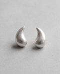 Silver Chunky Teardrop Stud Earrings - product flat lay on grey background