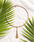 Gold Hammered Elongated Pendant Collar Necklace - model wearing with black turtleneck