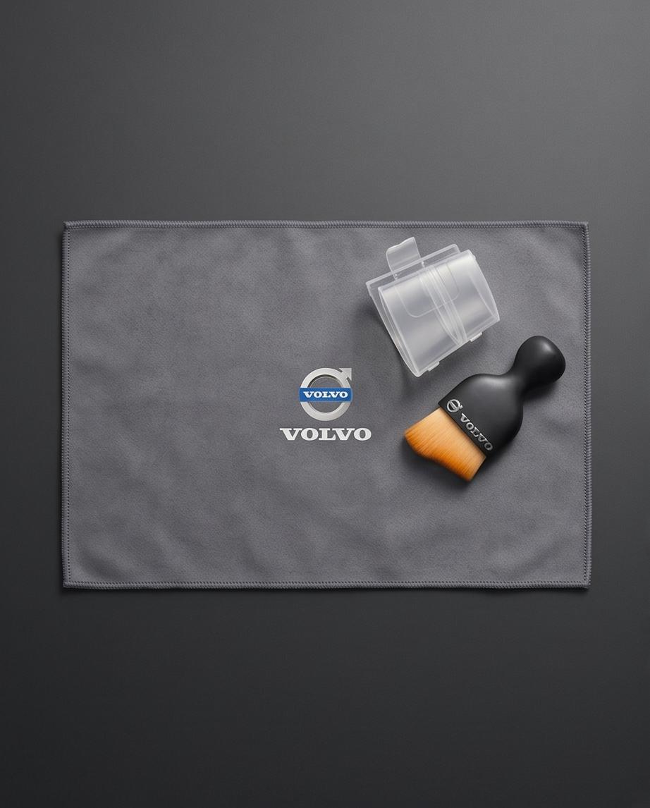 Volvo Car Dashboard Cleaning Set placed on leather car seat