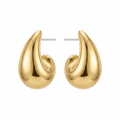 Gold earrings on a white background