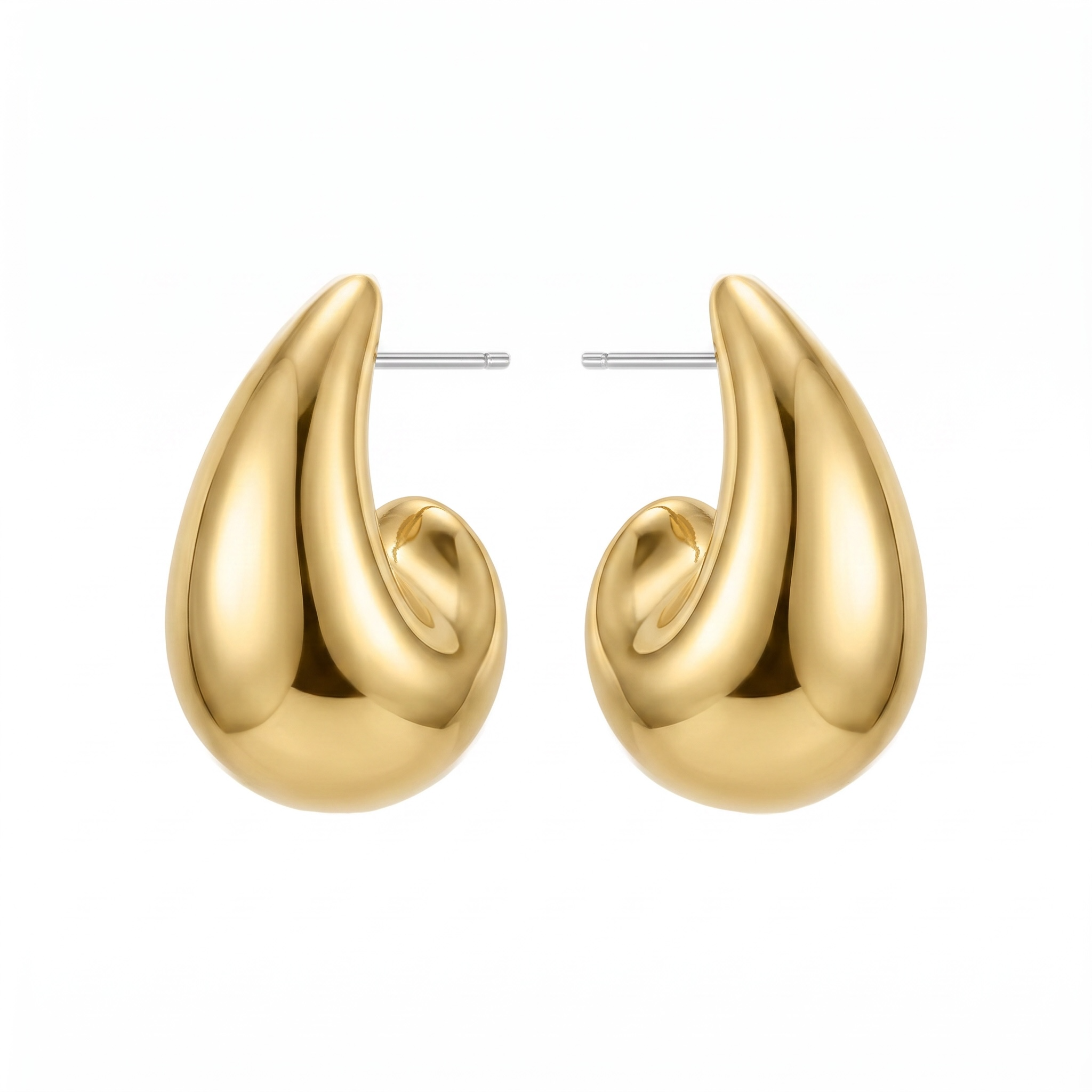 Gold earrings on a white background