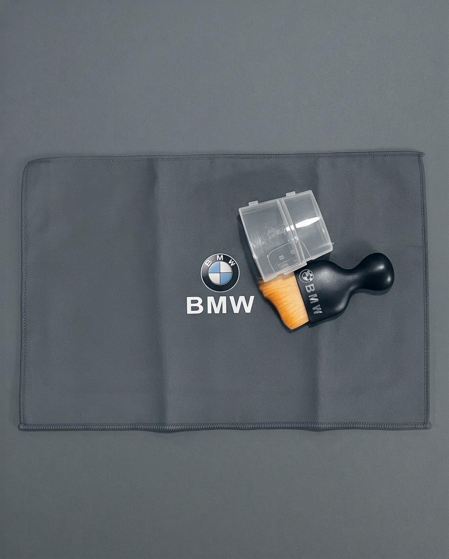 BMW Car Dashboard Cleaning Set flat lay — microfibre cloth and brush