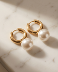 Gold pearl drop huggie hoop earrings in cream velvet jewellery box