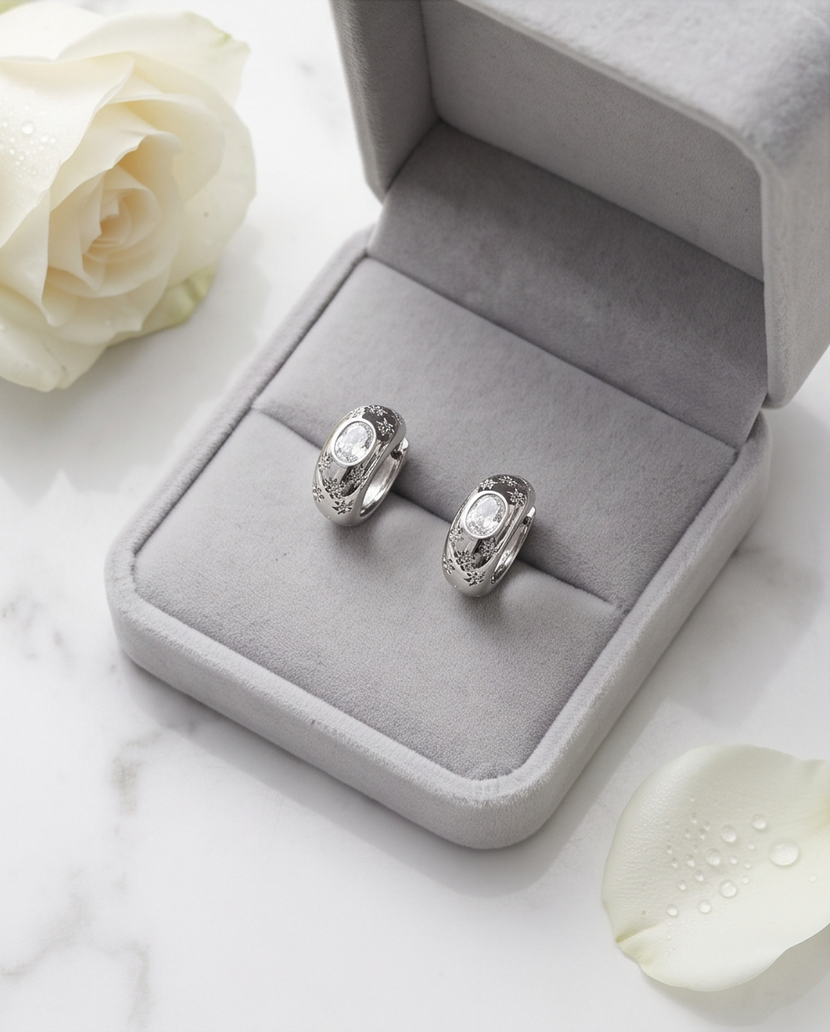 Silver Celestial Star Hoop Earrings — close-up star and CZ detail
